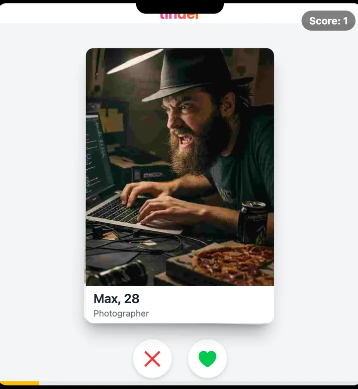 The Tinder round: Max, 28, photographer, an angry bearded man coding next to a pizza, with swipe left and right buttons